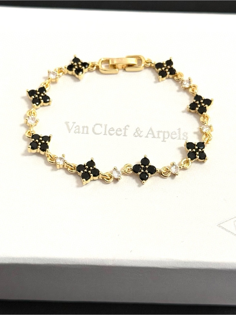 Van Cleef & Arpels Gold Bracelet with Black Motif Accents